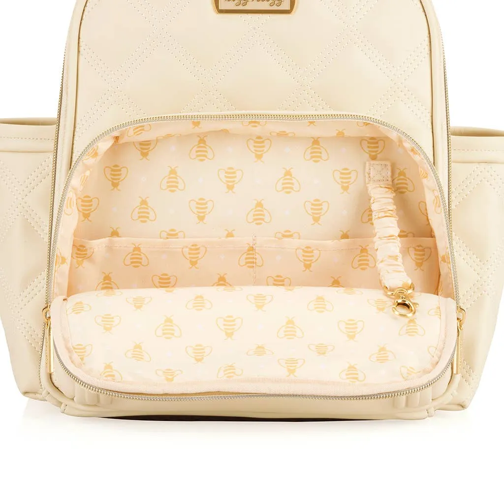 Itzy Ritzy -  Itzy Mini Plus Diaper Bag Backpack Milk & Honey