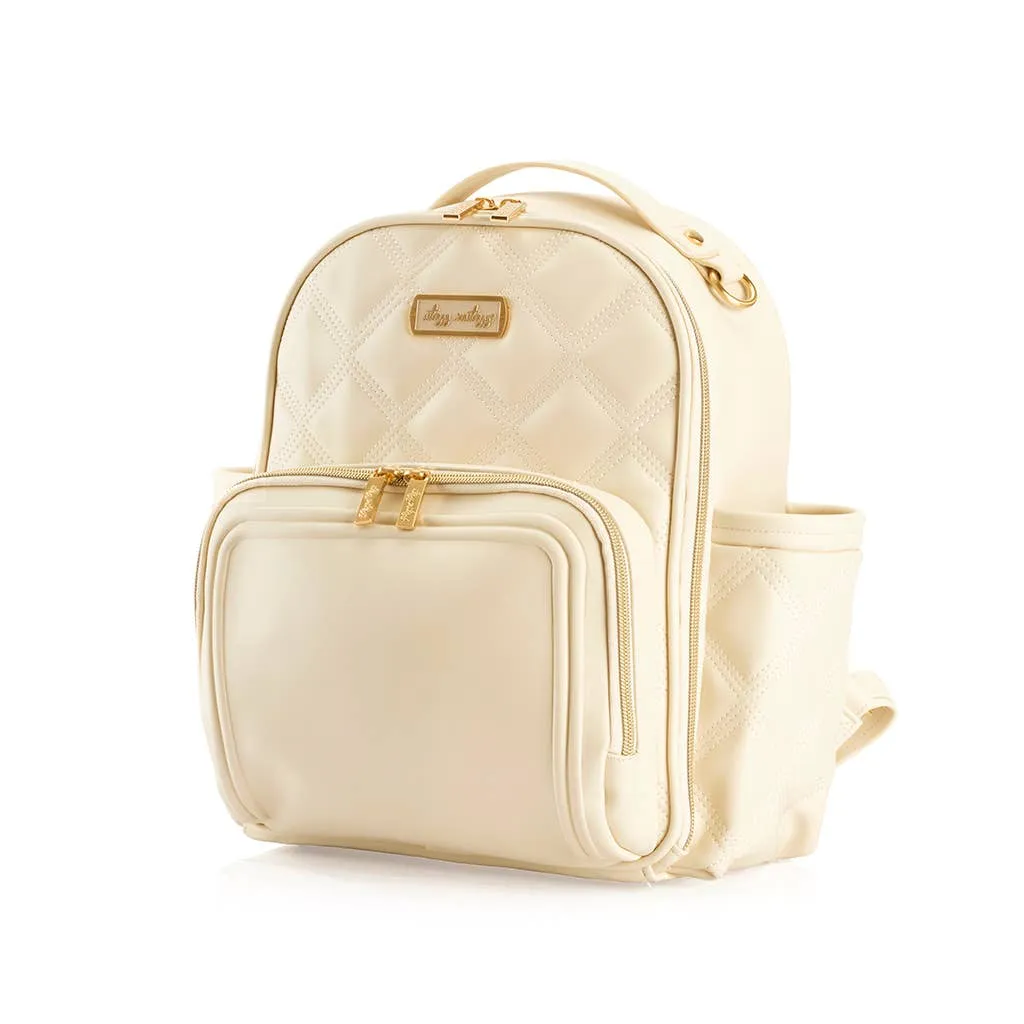 Itzy Ritzy -  Itzy Mini Plus Diaper Bag Backpack Milk & Honey