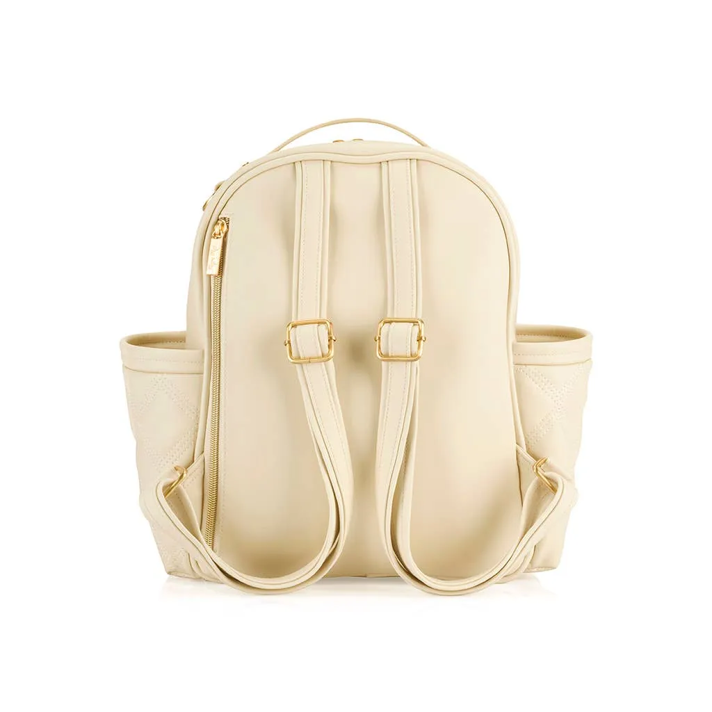 Itzy Ritzy -  Itzy Mini Plus Diaper Bag Backpack Milk & Honey