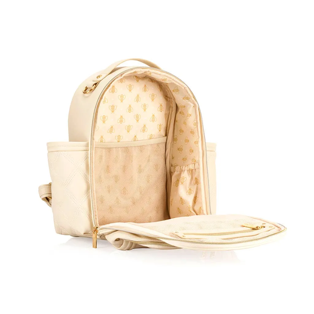 Itzy Ritzy -  Itzy Mini Plus Diaper Bag Backpack Milk & Honey